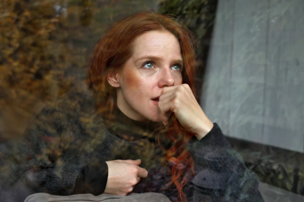 Portrait of a young woman thinking
